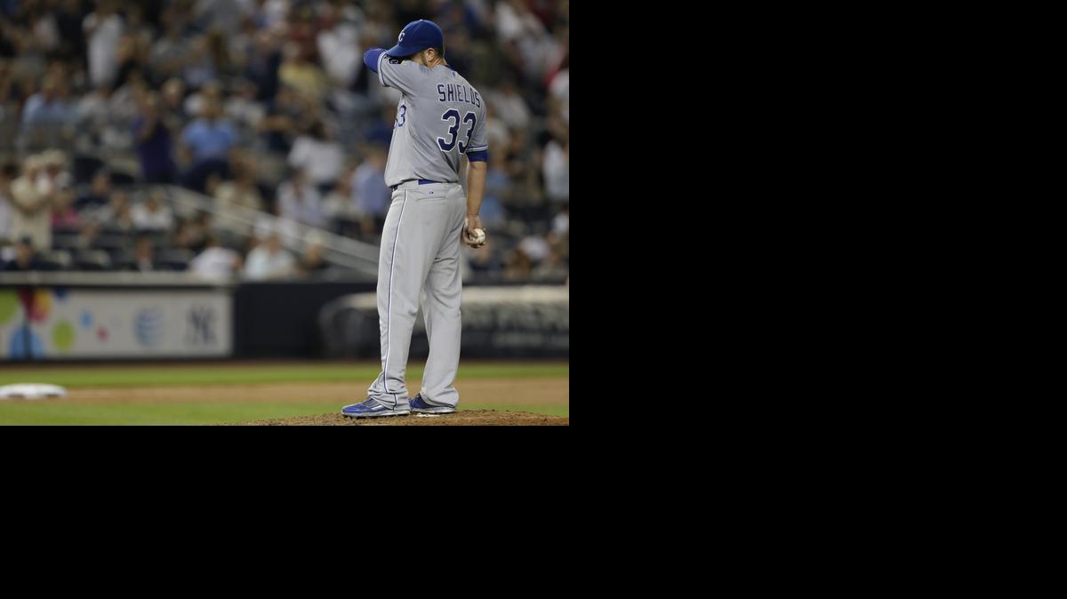 
Royals starter James Shields wipes his face in the ninth inning. He didn’t allow a run over 8 1/3 innings in leading Kansas City past New York.
