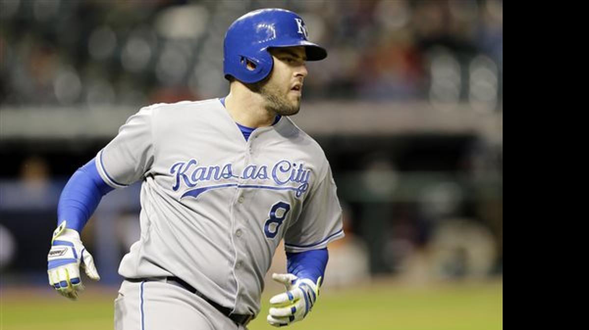 
Kansas City Royals Mike Moustakas runs to first base after hitting an RBI-single off Cleveland Indians starting pitcher Corey Kluber in the seventh inning of a baseball game, Monday, April 27, 2015, in Cleveland. Jarrod Dyson scored on the play. (AP Photo/Tony Dejak)
