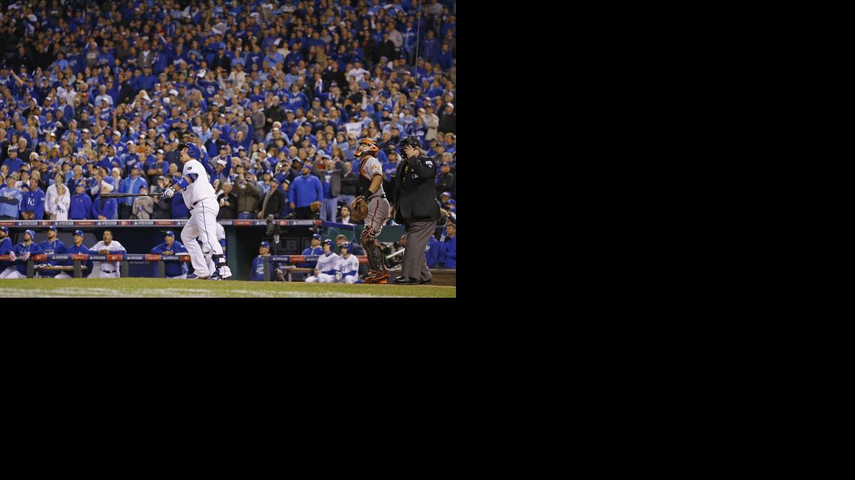 
Kansas City’s Billy Butler watches his sacrifice fly during the sixth inning of Game 3 of the American League Championship Series against Baltimore on Tuesday in Kansas City, Mo.
