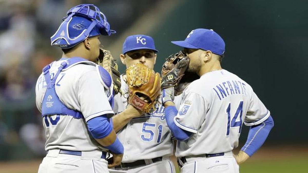 
Kansas City Royals starting pitcher Jason Vargas, center, talks with catcher Salvador Perez, left, and second baseman Omar Infante during the first inning Wednesday in Cleveland. 
