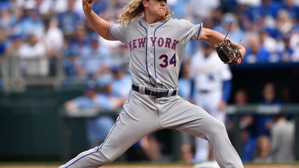 Five months ago, Noah Syndergaard shook up Game 3 of the World Series with a 98-mph fastball that danced near the chin of Kansas City shortstop Alcides Escobar. On Tuesday at Kauffman Stadium, he stymied the Royals’ hitters, limiting them to three hits and striking out nine batters as the Mets won 2-0.