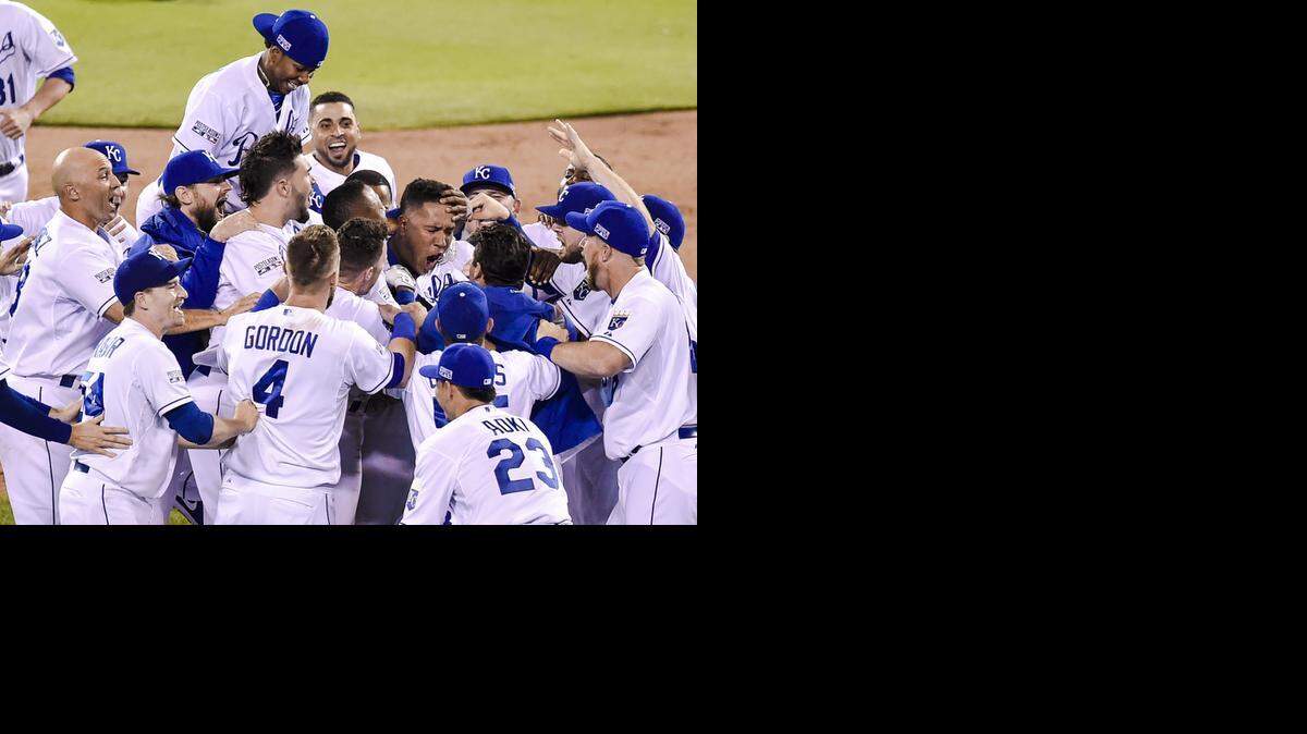 
The Kansas City Royals swamp teammate Sal Perez on Tuesday, Sept. 30, at Kauffman Stadium in Kansas City. The Royals won the AL Wild Card Game, 9-8, against the Oakland As.
