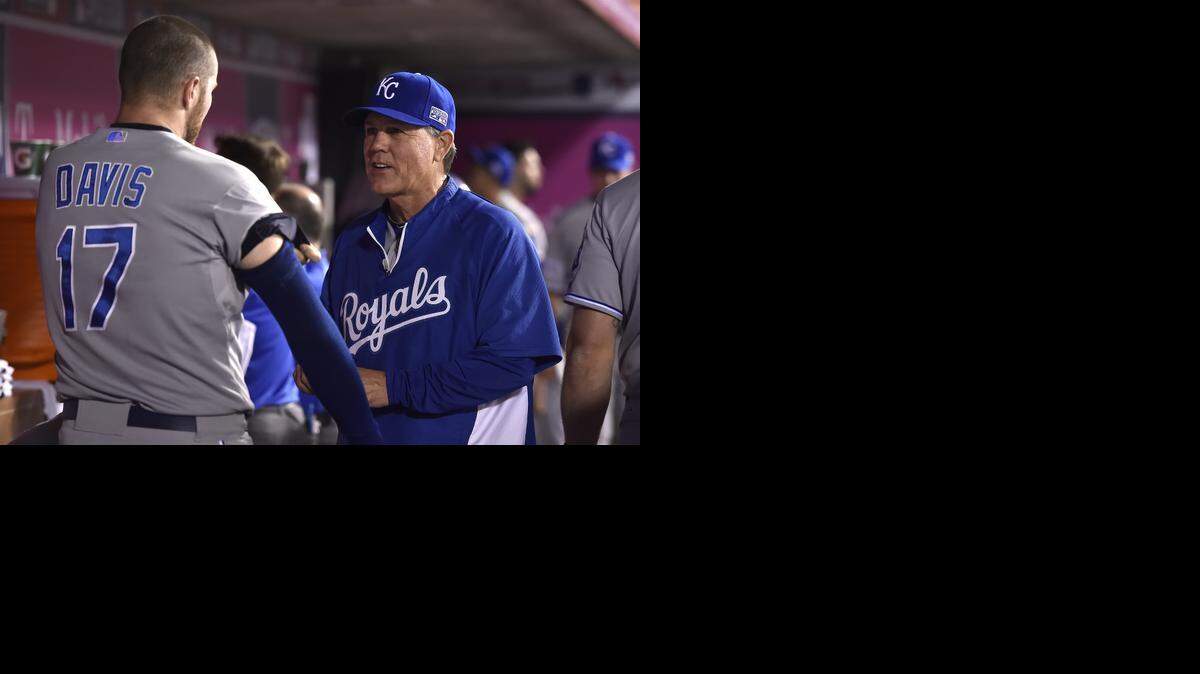 
Kansas City Royals manager Ned Yost (3) spoke in the dugout with Kansas City Royals relief pitcher Wade Davis (17) after the eighth inning against the Los Angeles Angels during Thursday's ALDS baseball game on October 2, 2014 at Angels Stadium in Anaheim, Calif.

