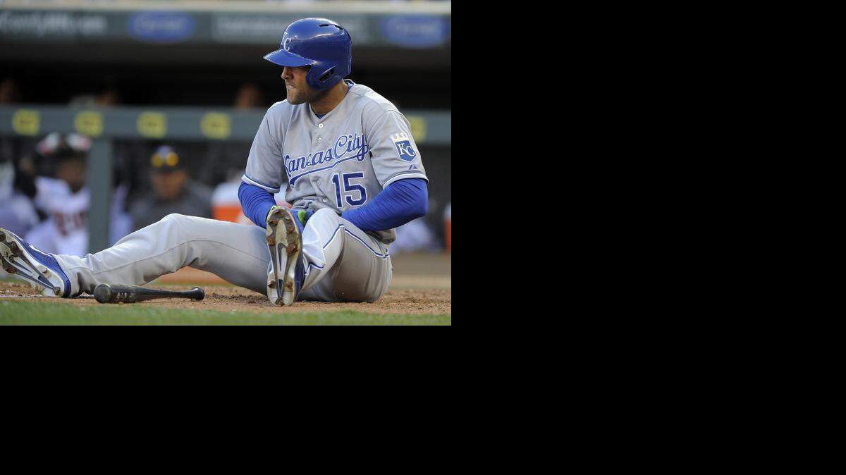
Royals batter Alex Rios looks out at Twins pitcher J.R. Graham after being hit on the wrist during the eighth inning Monday in Minneapolis.
