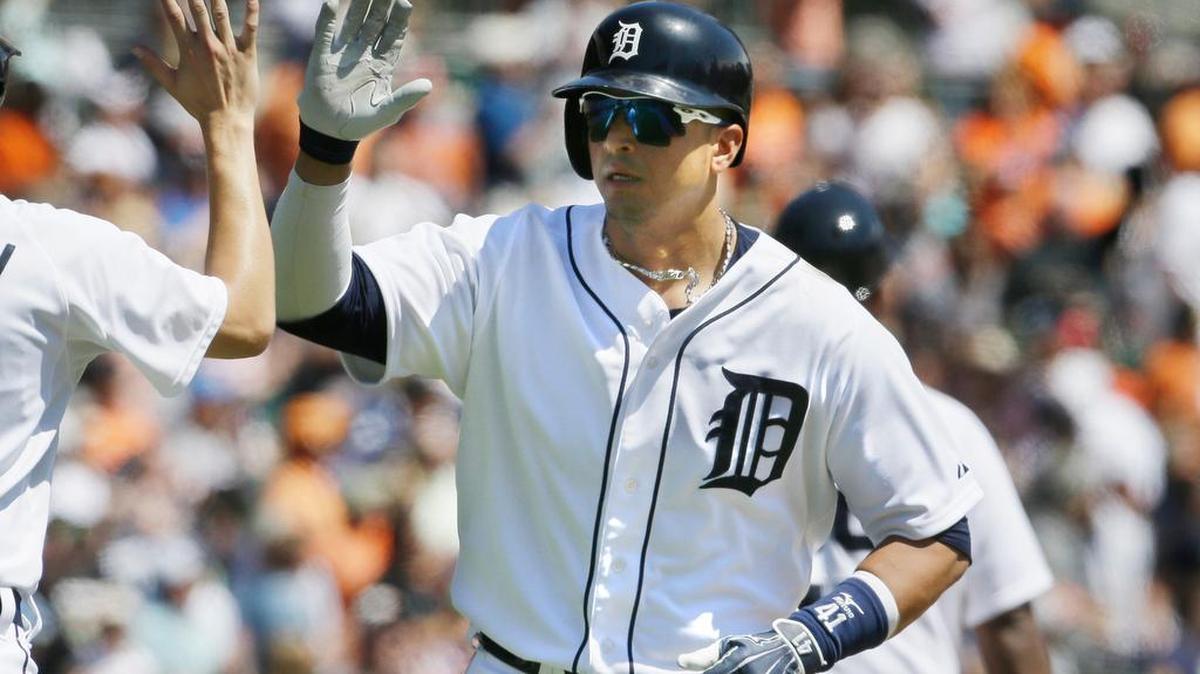 
Detroit Tigers designated hitter Victor Martinez is high-fived after his two-run home run off Kansas City Royals starting pitcher Yordano Ventura during the fifth inning Thursday in Detroit.
