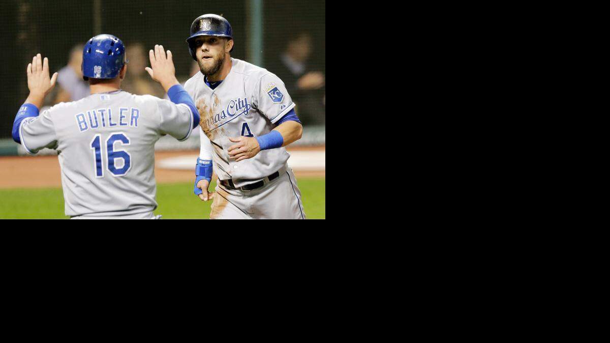 
The Royals’ Billy Butler (left) and Alex Gordon celebrated after scoring on a two-run double by Salvador Perez in the fifth inning against the Indians on Tuesday night in Cleveland.
