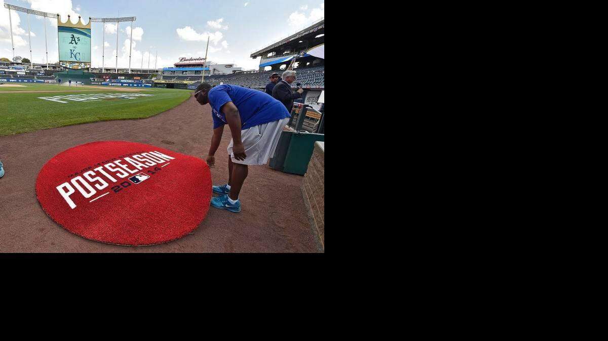 
The on-deck circle is placed placed next to the Kansas City Royals dugout in preparation for Tuesday's playoff baseball game at Kauffman Stadium.
