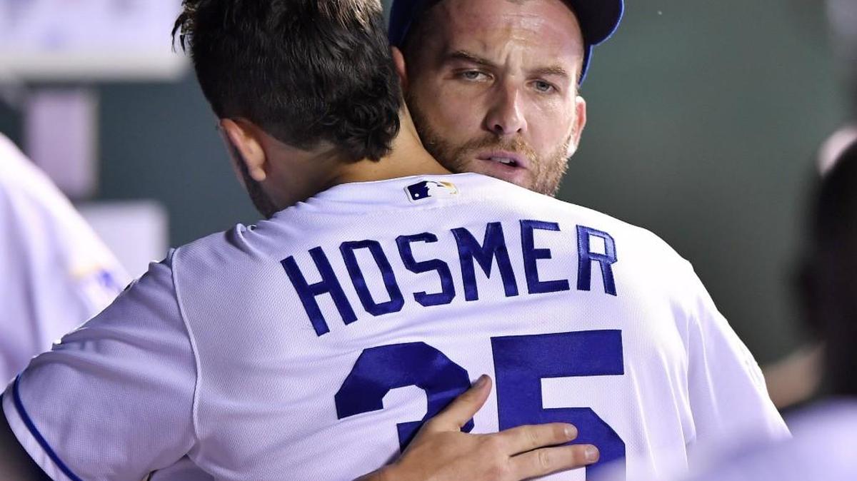 Royals pitcher Danny Duffy gets a hug from Eric Hosmer after finishing up the eighth inning. Duffy gave up two runs over eight innings in tying the longest start of his big-league career.