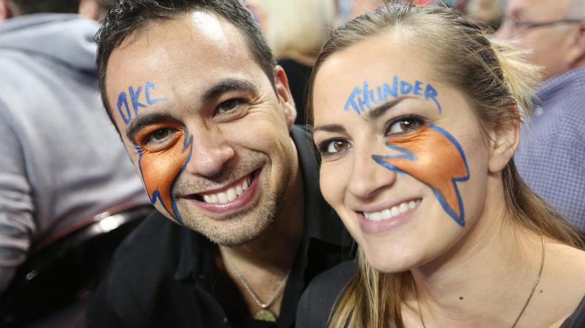 
Oklahoma City Thunder fans Aaron Rayner and Sarah Stuart sat near the court during the preseason NBA game against the Toronto Raptors at Intrust Bank Arena in October 2014.
