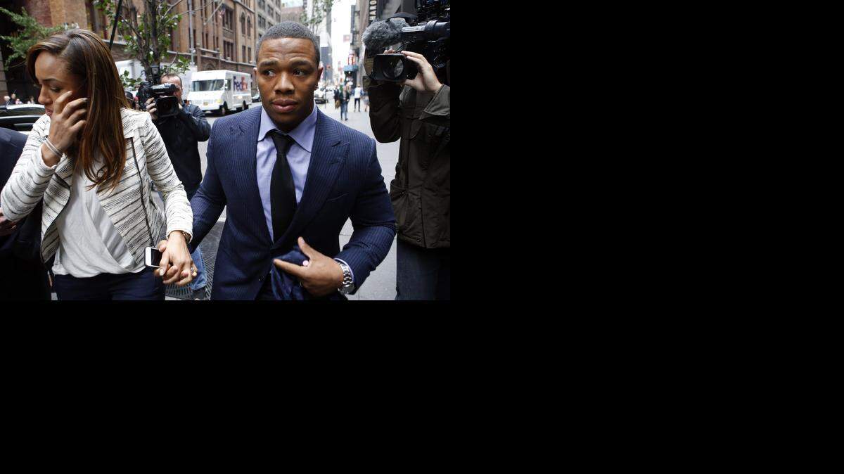 
Ray Rice arrives with his wife Janay Palmer for an appeal hearing of his indefinite suspension from the NFL, Wednesday, Nov. 5, 2014, in New York. (AP Photo/Jason DeCrow)
