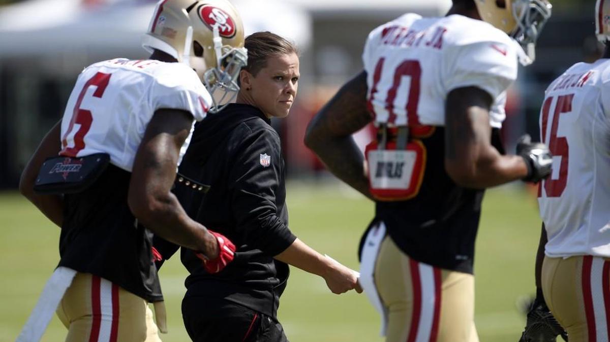Katie Sowers, a Hesston native, has been hired as a full-time assistant by the San Francisco 49ers of the National Football League. Sowers is seen here at 49ers training camp in Santa Clara, Calif., on Aug. 8.