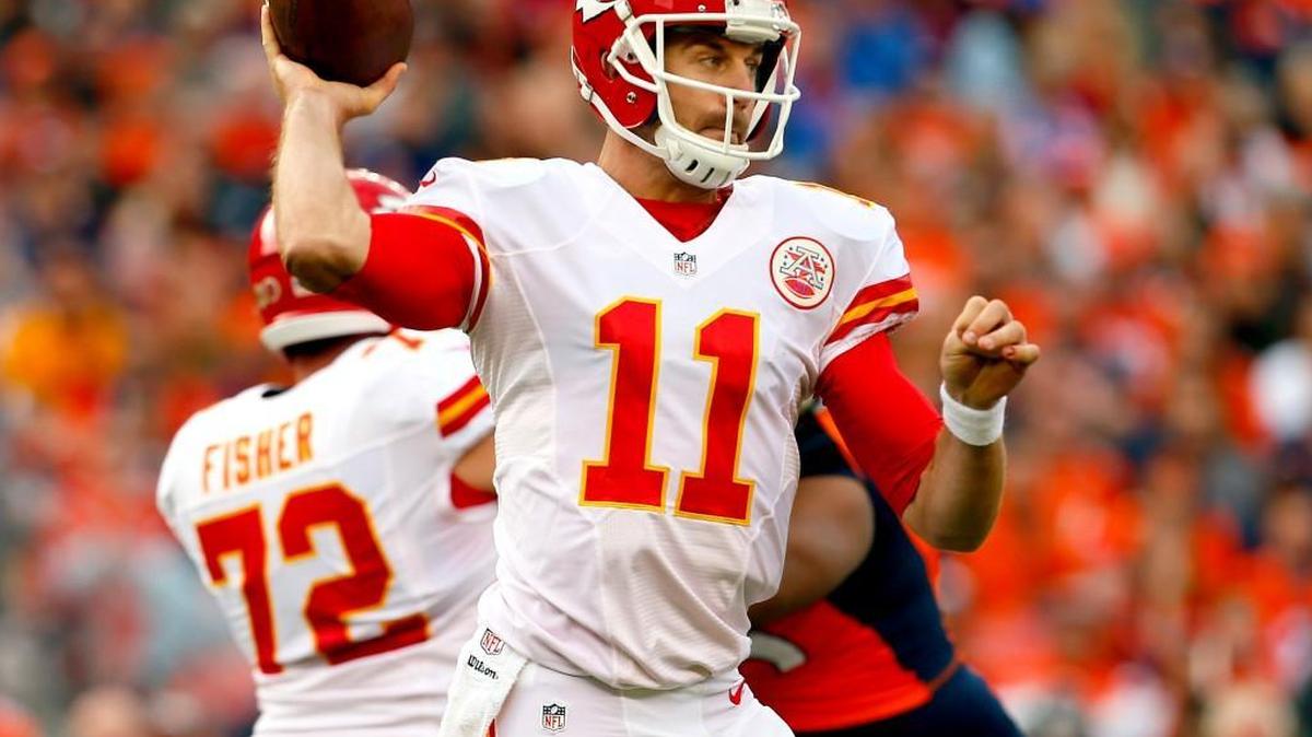 Kansas City Chiefs quarterback Alex Smith throws against the Denver Broncos during the first half of Sunday’s game in Denver