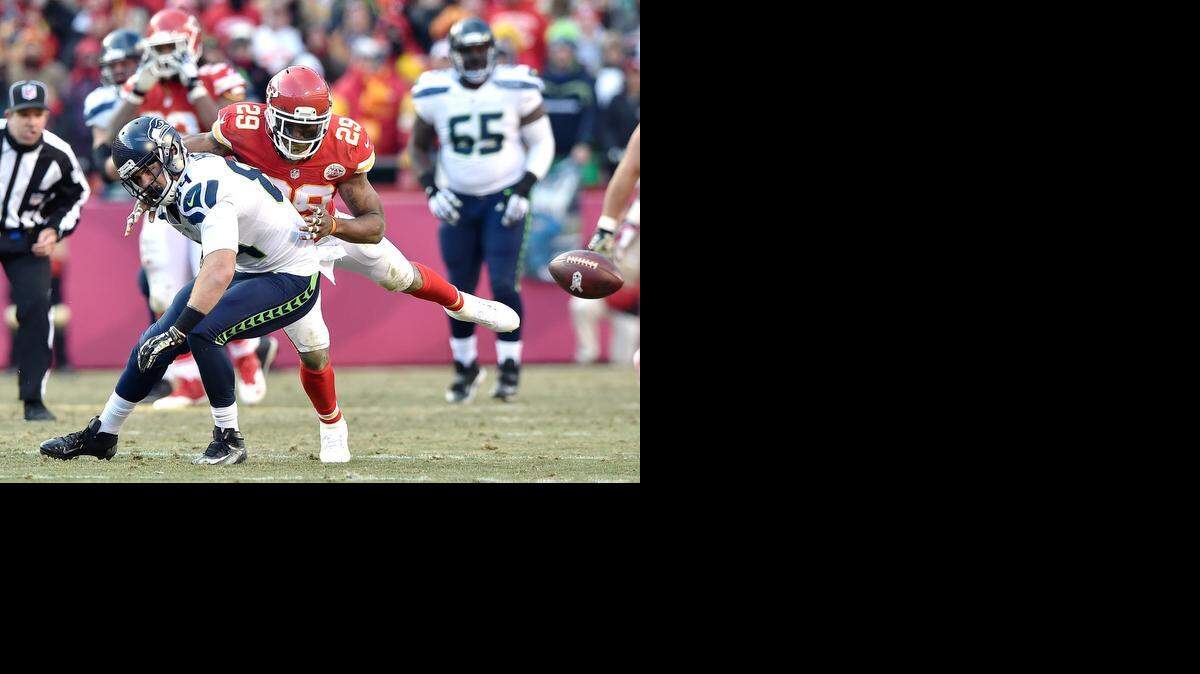 
Kansas City Chiefs strong safety Eric Berry (29) breaks up a pass intended for Seattle Seahawks tight end Cooper Helfet (84) with 1:53 remaining in the fourth quarter during Sunday's football game on November 16, 2014 at Arrowhead Stadium in Kansas City, Mo.
