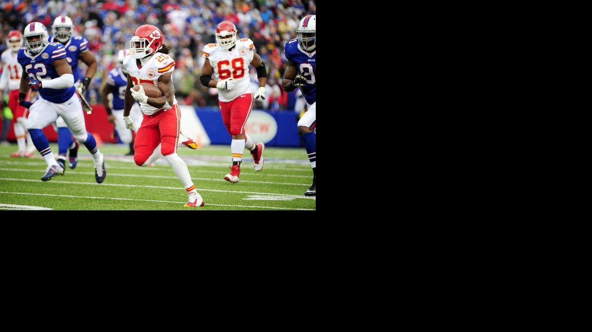 
Kansas City Chiefs running back Jamaal Charles runs for a touchdown against the Buffalo Bills during the second half of an NFL football game, Sunday, Nov. 9, 2014, in Orchard Park, N.Y. 
