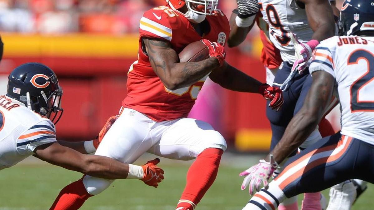 
Charcandrick West 
Chiefs running back Charcandrick West ran through Chicago Bears defenders including cornerback Kyle Fuller (left) in the third quarter on Sunday, Oct. 11, 2015, at Arrowhead Stadium.
