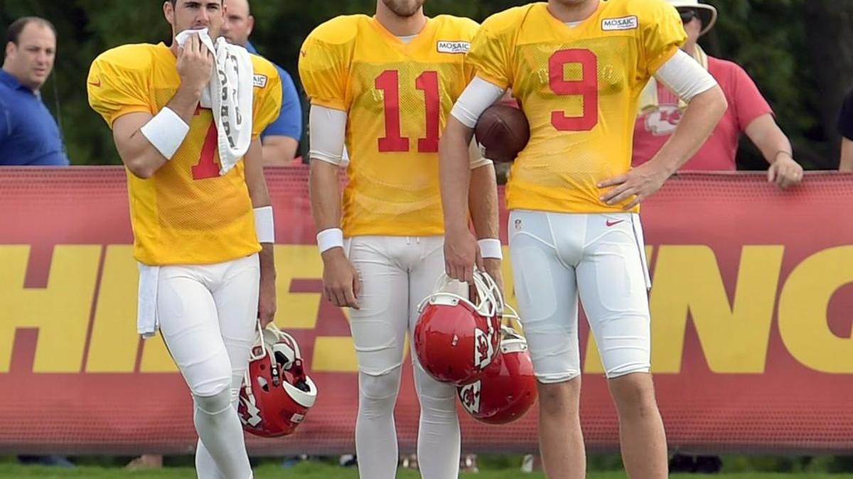 Aaron Murray, left, Alex Smith and Tyler Bray watch during Chiefs practice last week in St. Joseph, Mo. Nick Foles signed with Kansas City on Friday, meaning less of a likelihood that Murray and Bray will remain with the team throughout the preseason.
