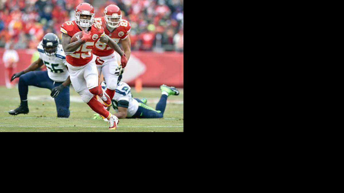 
Jamaal Charles runs for 16 yards during Sunday’s game against the Seahawks at Arrowhead Stadium.
