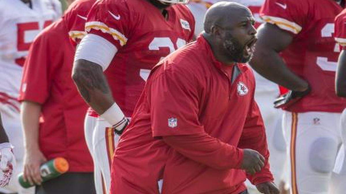 
Kansas City Chiefs running backs coach Eric Bieniemy shouts during a drill at training camp this summer in St. Joseph, Mo.
