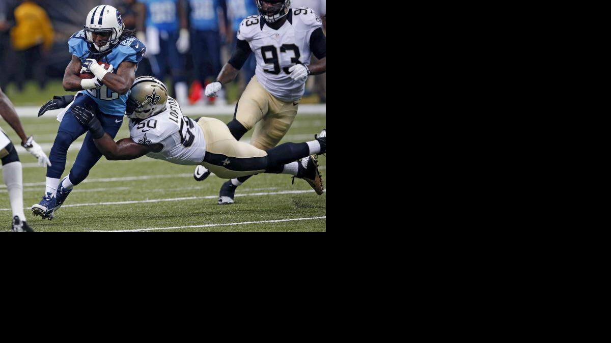 
Tennessee Titans running back Dexter McCluster carries the ball against the Saints during a preseason game last month.
