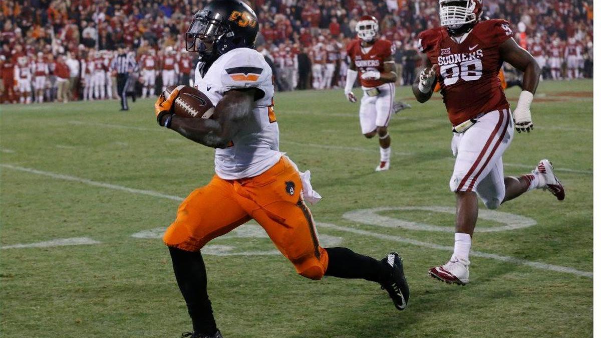Chiefs draft pick Tyreek Hill (left) played at Oklahoma State before he ended up at West Alabama.