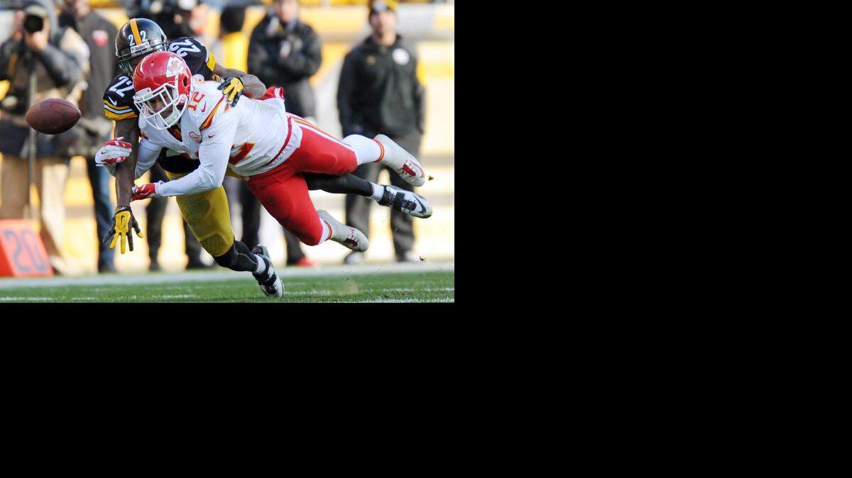 
Pittsburgh Steelers cornerback William Gay (22) breaks up a pass intended for Kansas City Chiefs wide receiver Albert Wilson (12) during the second half of an NFL football game in Pittsburgh, Sunday, Dec. 21, 2014. (AP Photo/Don Wright) 
