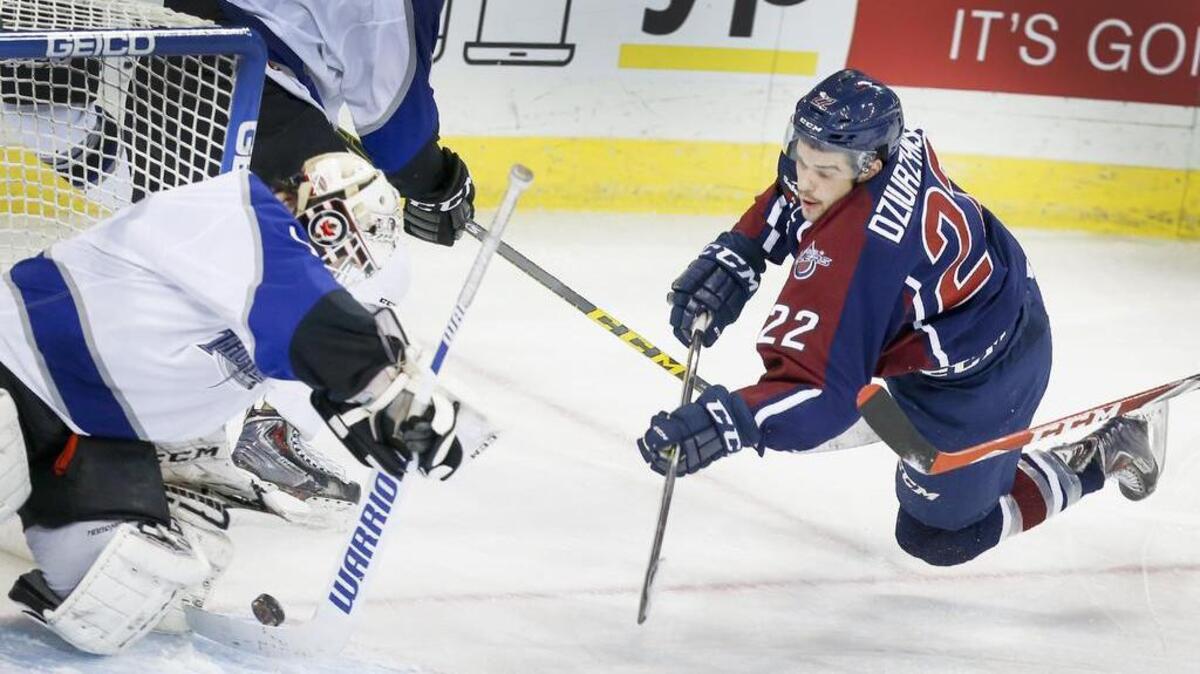 Thunder goalie david Shantz, left, block a shot by Tulsa's Darian Dziuynski in the third period at Intrust Bank Arena Wednesday. (Nov. 11, 2015)