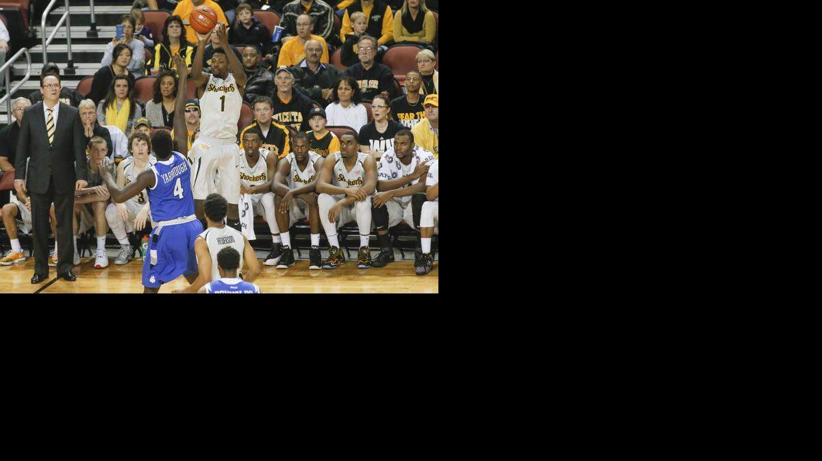 
Wichita State's Zach Brown hits a three-pointers against Saint Louis' during the second half on Saturday at Intrust Bank Arena. 
