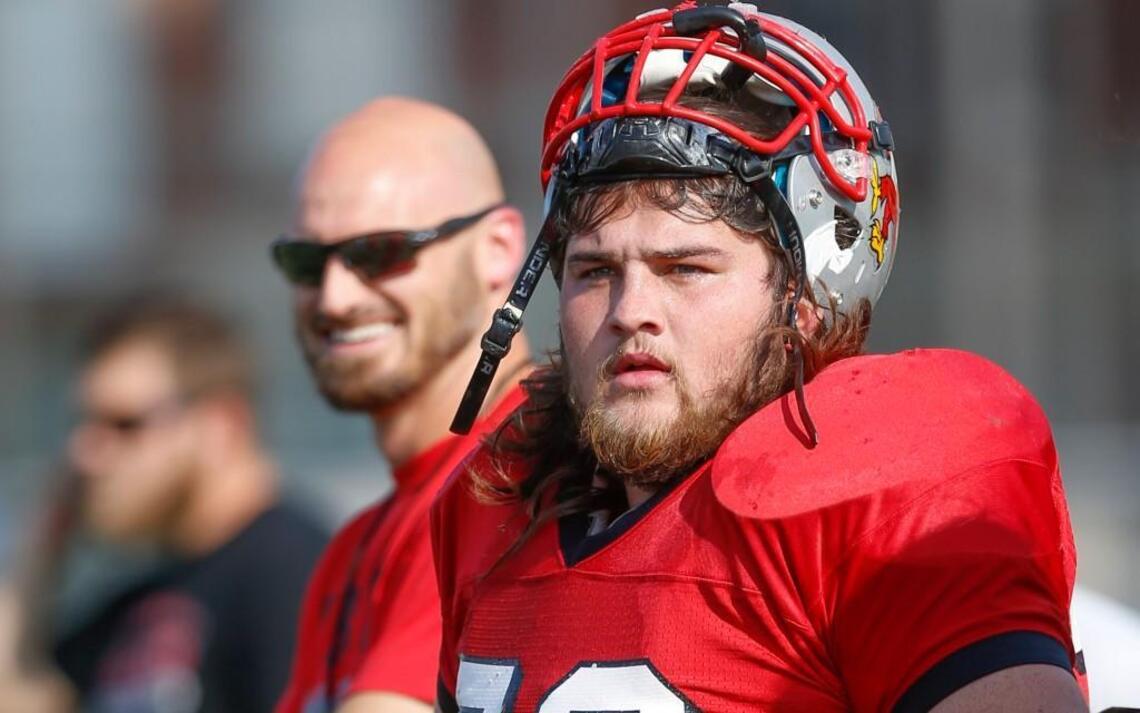 Friends senior lineman Mitch Butterfield talks on campus, learns on field