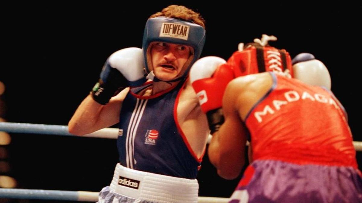 Albert Guardado Jr., left, fights Madagascar’s Anicet Rasoanaivo during the 1996 Olympics in Atlanta. Guardado is from Topeka.