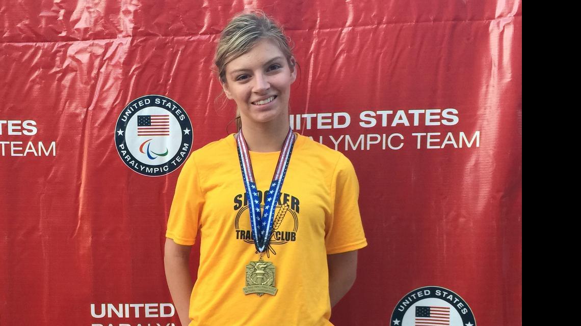 
Madison Castillo shows off her long-jump medal she won in June at the U.S. Paralympics Track and Field National Championships in St. Paul, Minn.
