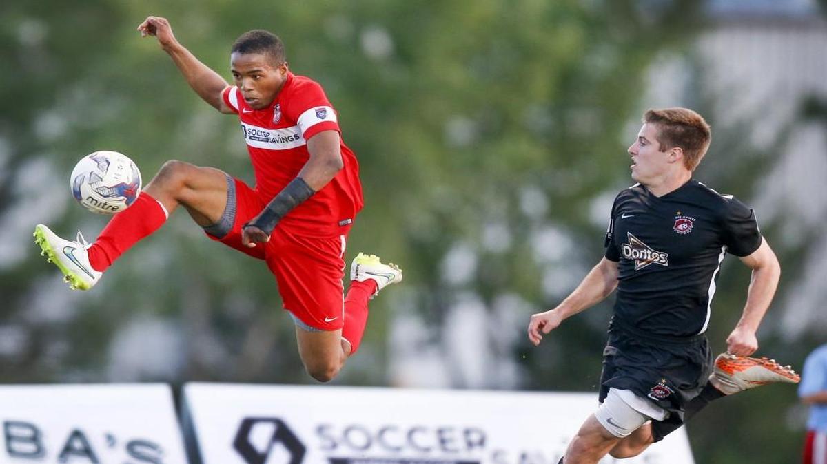 FC Wichita’s Max Touloute, left, controls the ball against Des Moines in the second half of a U.S. Open Cup match Wednesday at Stryker Complex. The Menace won 2-1 in FC Wichita’s first appearance in the national tournament.