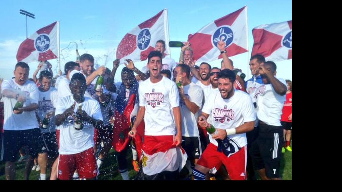 
Members of FC Wichita celebrate after defeating Fort Worth Vaqueros FC on Sunday. The team earned a playoff berth in the NPSL playoffs. (July 12, 2015) 
