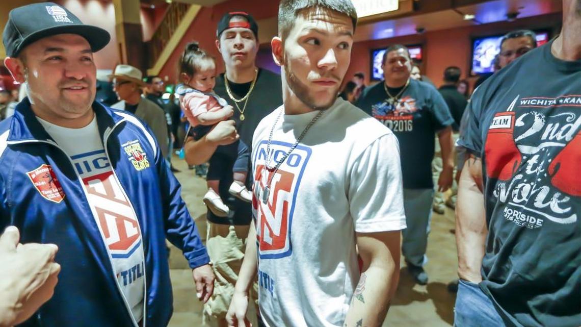 Nico Hernandez, center, and his father Lewis Hernandez, left, get ready for the weigh-in Friday at his first professional boxing match against Patrick Gutierrez at the Kansas Star Casino. The fight is Saturday night.