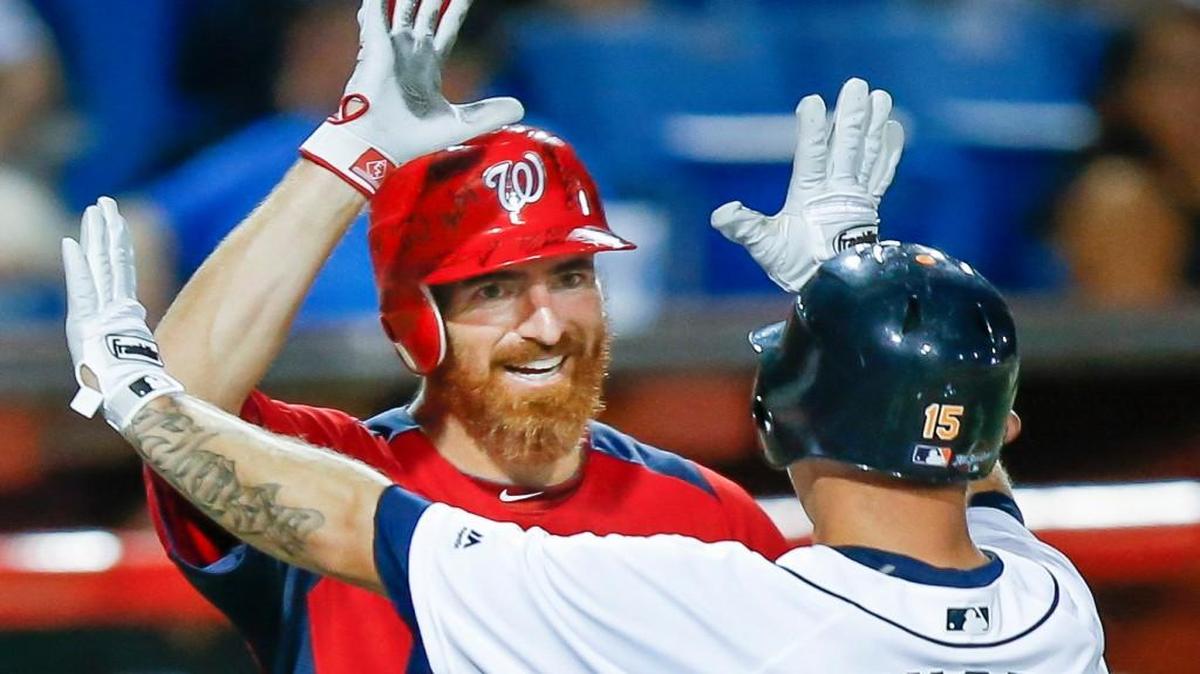 Adam LaRoche, left, greets Brandon Inge after Inge scored in the fourth inning Thursday night. LaRoche is one of the organizers of the team of former big-leaguers.