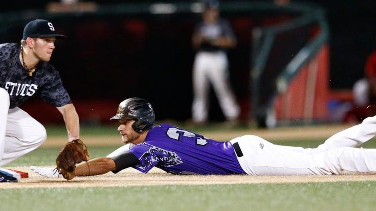 
Valley Center's Aaron Marshall slides safely into third base after hitting a triple against Seattle in the sixth inning Wednesday night at the NBC Tournament. Seattle won, though, and advances to Thursday’s final six teams as the only unbeaten remaining.
