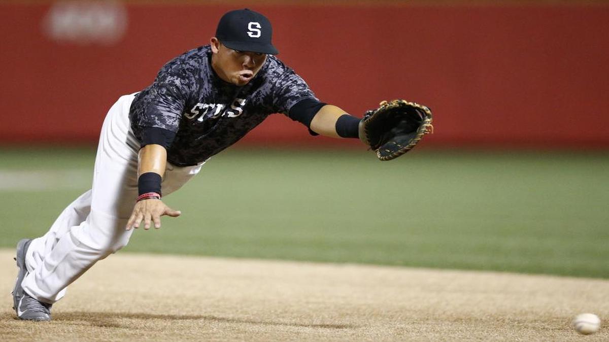 
Seattle first baseman Jose Ruiz stretches to reach a ball hit down the line in the sixth inning of Wednesday’s game against Valley Center at the NBC World Series. 
