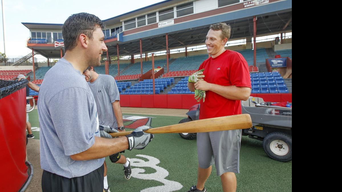 
Wichita State alumni players Cody Lassley, left, and Mike McDonald have some fun during practice on Wednesday at LD Stadium.
