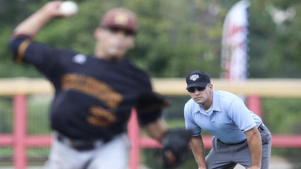 
National Baseball Congress umpire Charlie Clemens watches the action while serving as the third-base umpire during an NBC game on Friday afternoon.

