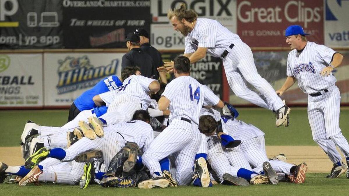 The Santa Barbara Foresters celebrate after defeating the Hays Larks and winning the 2016 NBC World Series championship Saturday at Lawrence-Dumont Stadium.