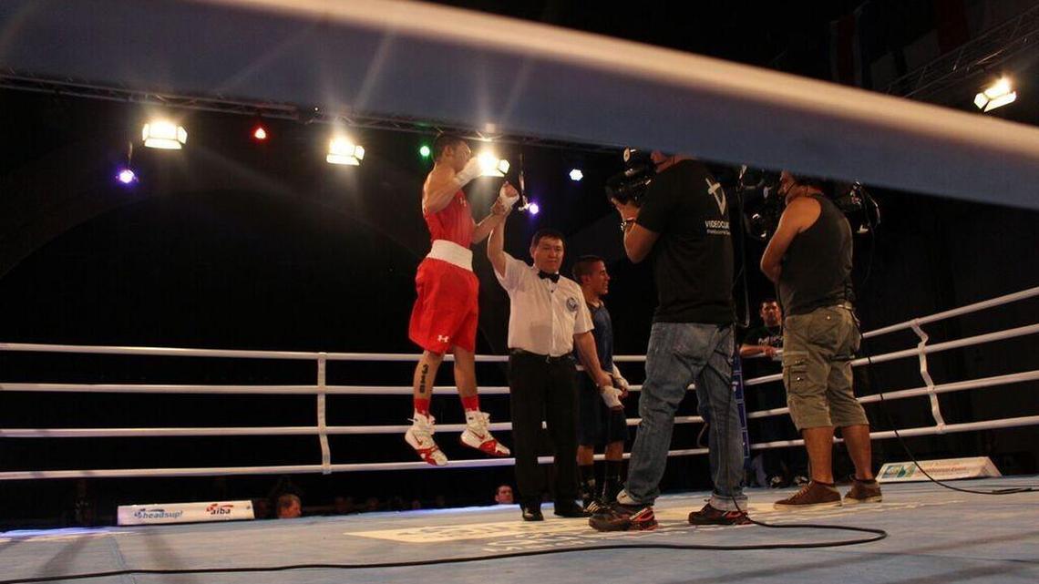 Nico Hernandez jumps after learning he had won his match Thursday over Argentinian Leandro Blanc and qualified for the Rio Olympics in August. Hernandez won the light flyweight match in Bueno Aires.