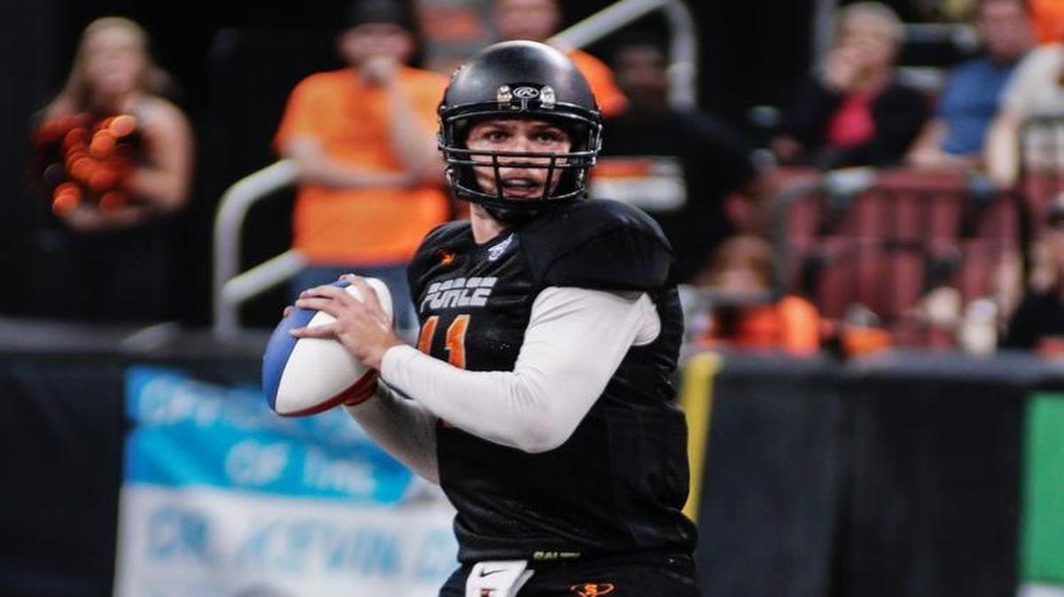 Wichita Force quarterback David Olson looks for an open receiver in the pocket in the first quarter during the Champions Indoor Football Champions Bowl II game against Amarillo Venom Monday night at INTRUST Bank Arena.(June 27th, 2016)