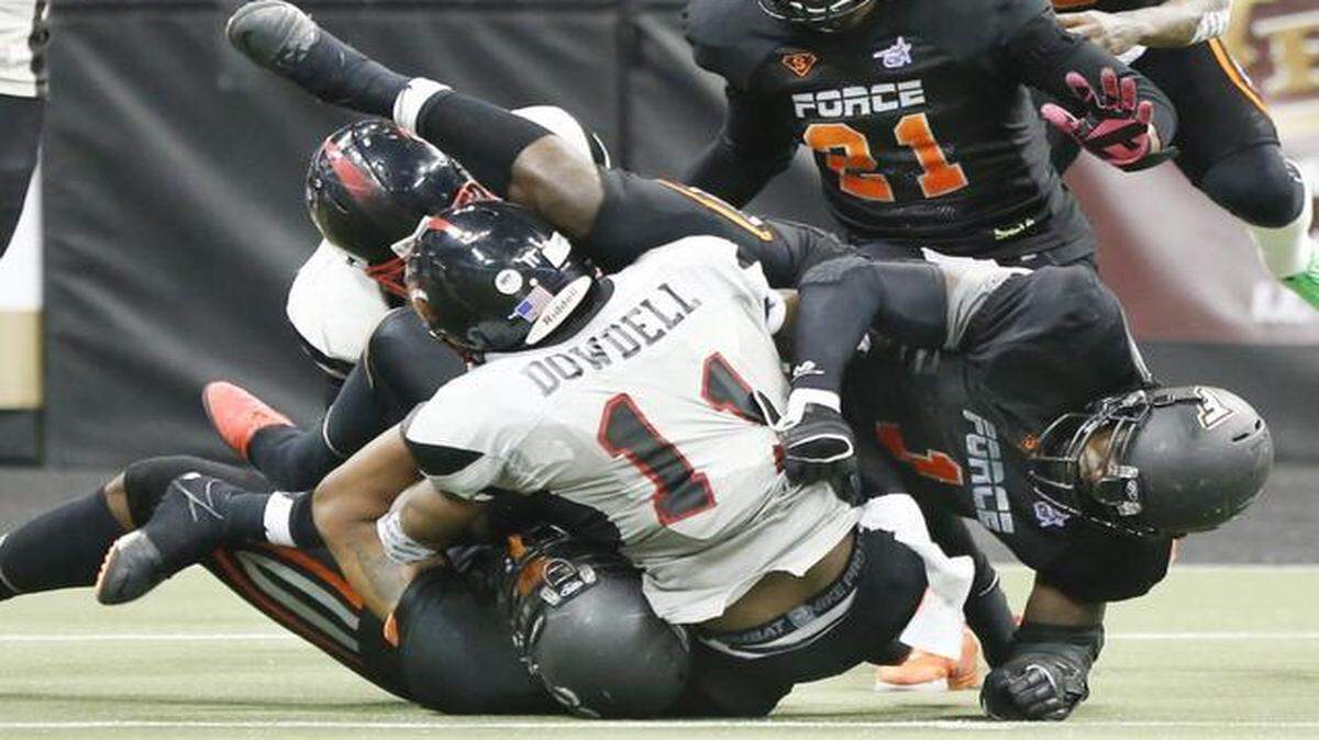 
The Force's Brandon Jenkins, left, and Jason Catchings, right, sack Sioux City's Charles Dowdell with 30 second to go to help seal the 42-35 win Saturday night at Intrust Bank Arena.
