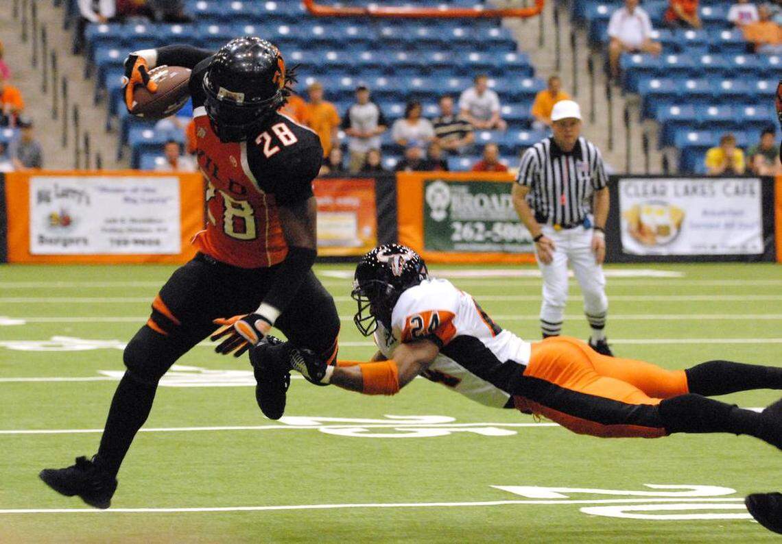 Wichita's Darius Fudge tries to leap past a tackle in a game from April 10, 2010.