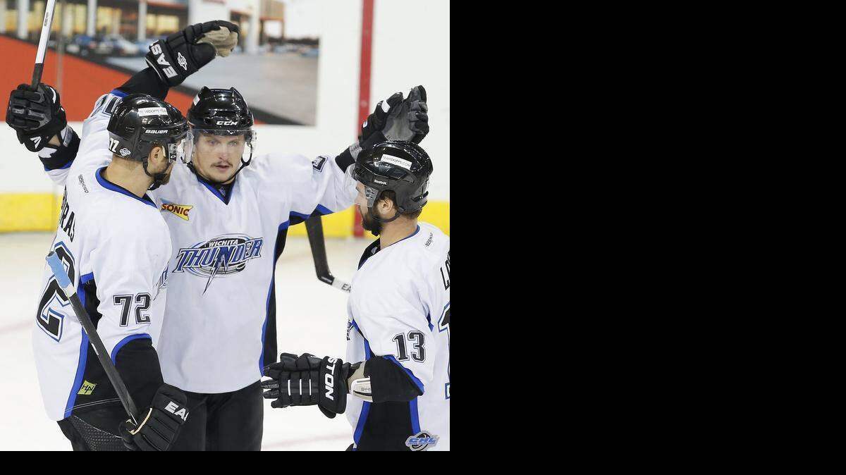 
The Thunder's Tomas Klempa, center, gets congratulated by teammates Jon Booras (72) and Ian Lowe (13) in a Nov. 2013 game at Intrust Bank Arena.
