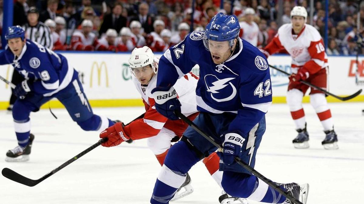 Tampa Bay Lightning center Dana Tyrell (42) rips a shot on goal against the Detroit Red Wings in Dec. 2013.