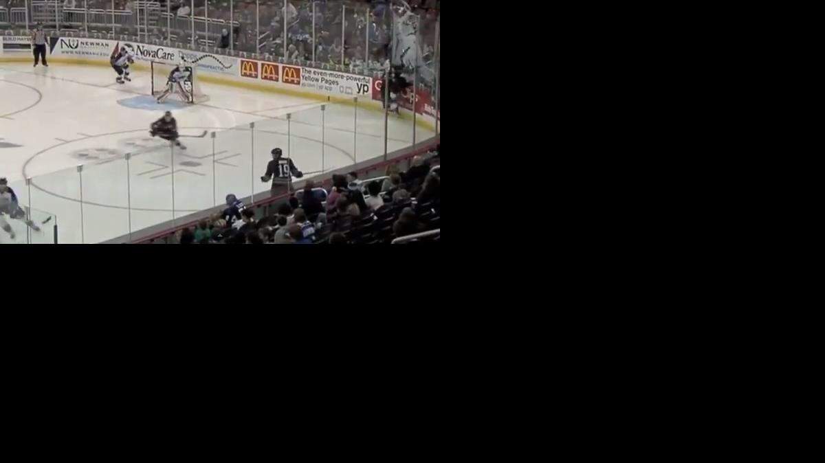 
A screenshot of Wichita Thunder player Theo Peckham crashing into and shattering glass around the rink at Intrust Bank Arena.
