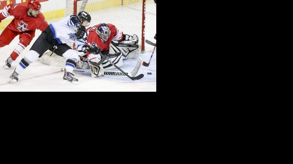 
The Thunder's Nikita Kashirsky gets his shot blocked by Allen goalie Riley Gill in the second period Saturday. 
