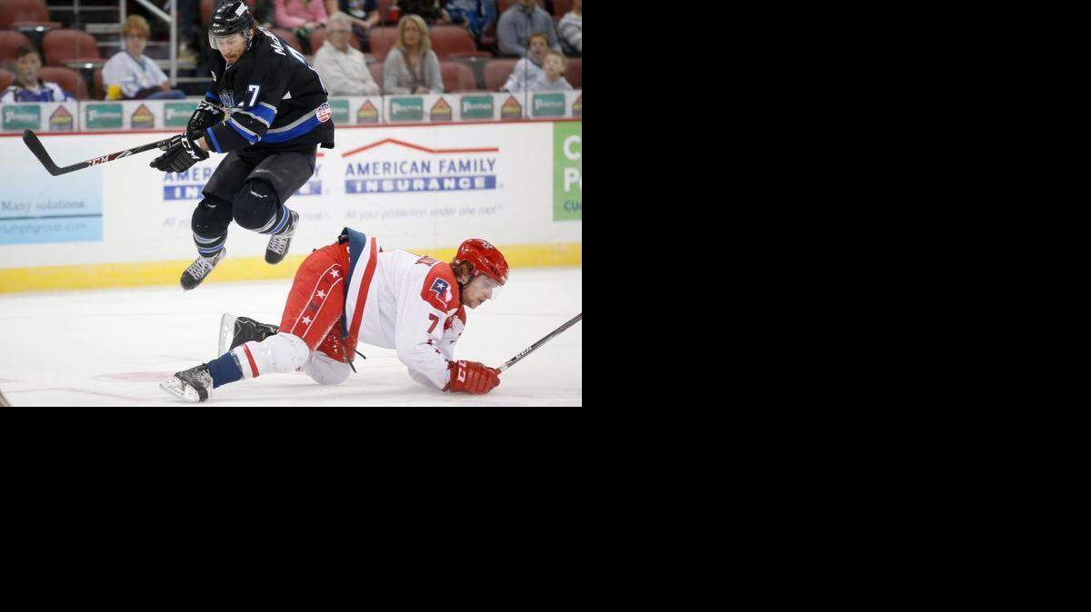 
The Thunder’s Mike MacIntyre jumps over Allen’s Nolan Descoteaux during the first period last week.
