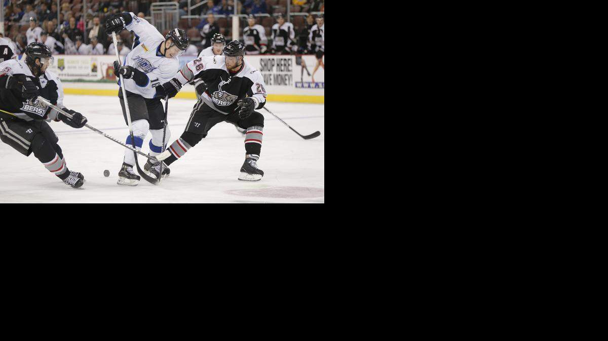 
The Thunder's Matt Robinson tries to keep control of the puck as he tries to split the Brampton defense in the second period at Intrust Bank Arena last November.
