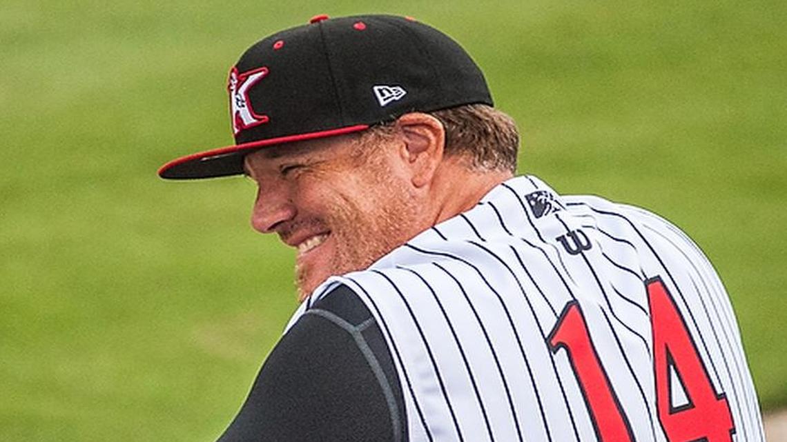 Pete Rose Jr. laughs in the dugout while managing the Kannapolis (N.C.) Intimidators in 2014. Kannapolis is a Class-A affiliate of the Chicago White Sox.